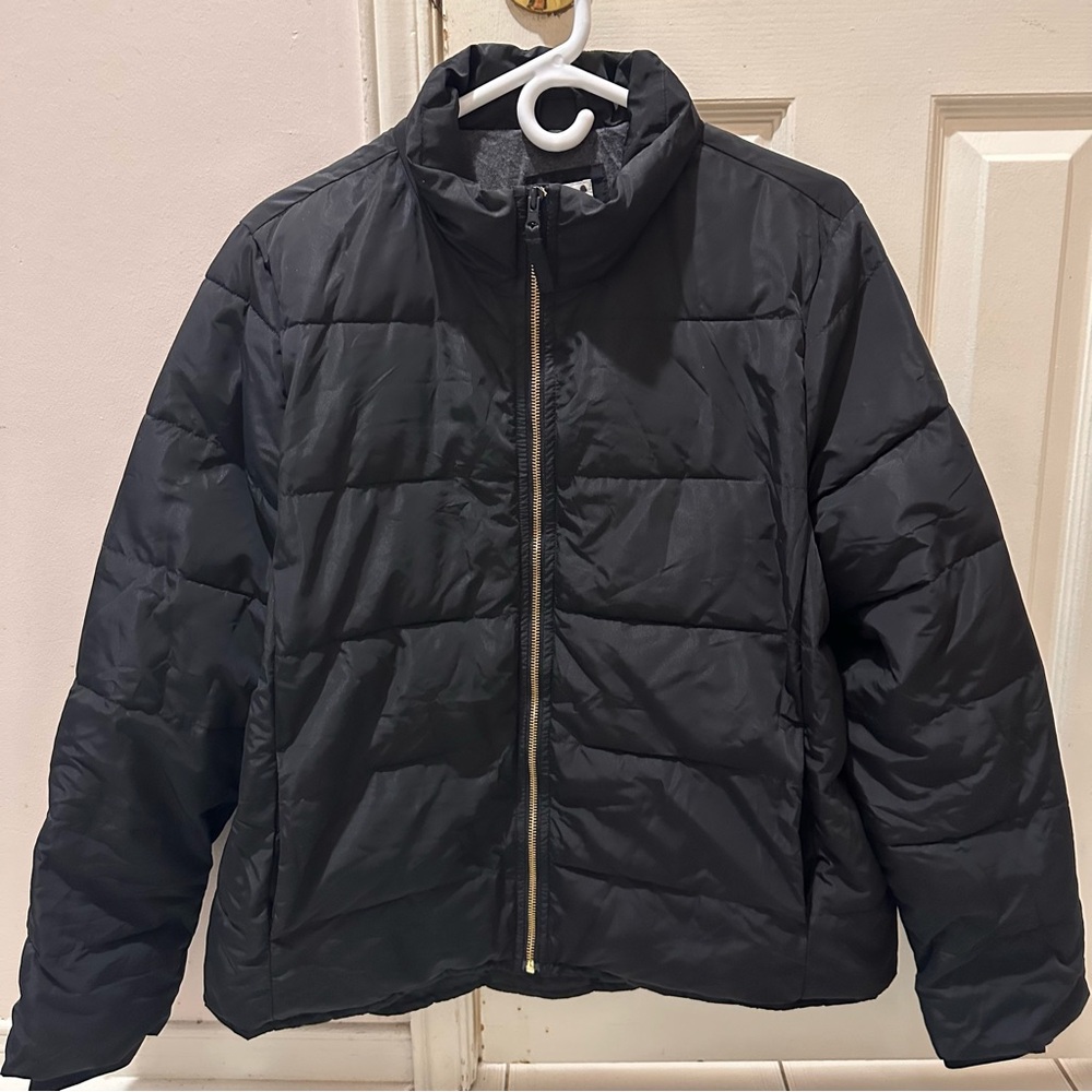 Gap women’s black puffer jacket with gold zipper